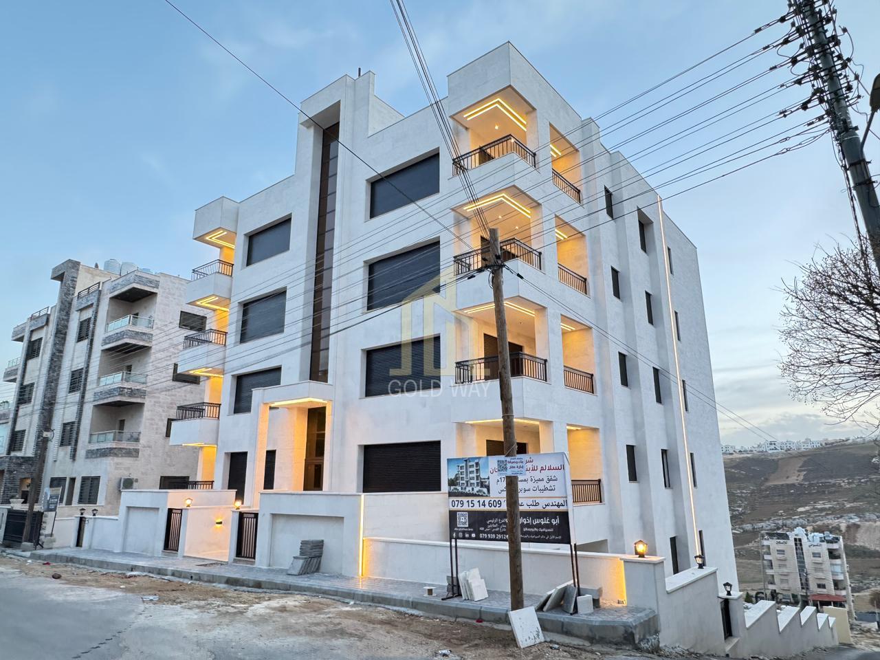 في شارع الأردن بعد مشفى الملكة علياء شقة أخير مع روف 210م جديدة لم تسكن